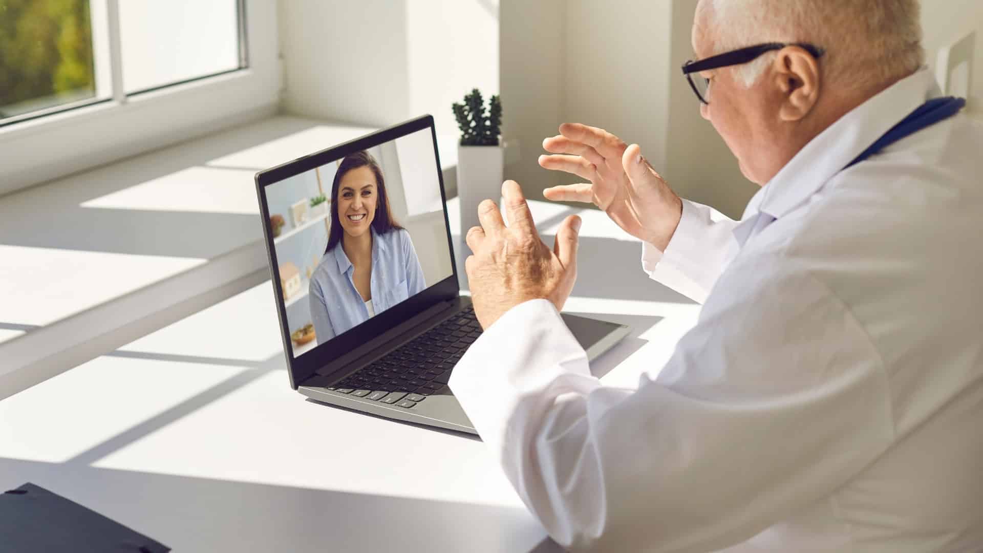 Doctor conducting a telehealth medical marijuana evaluation with a patient via video call